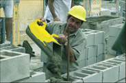 Filling concrete blocks